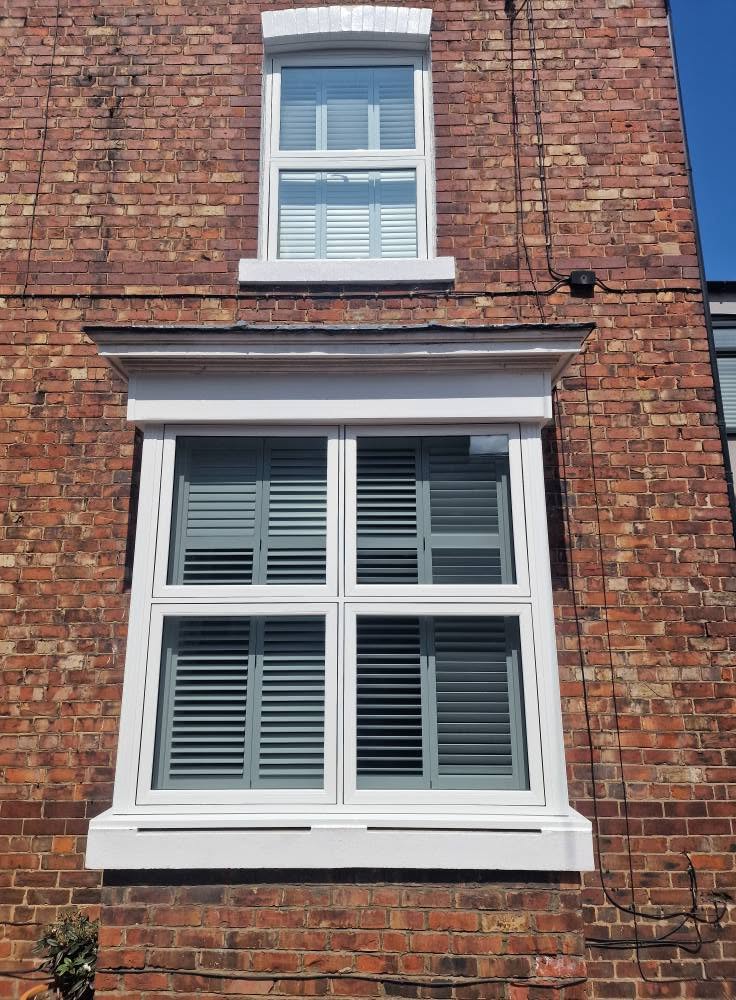 Liniar flush sash upper and bay windows in white uPVC
