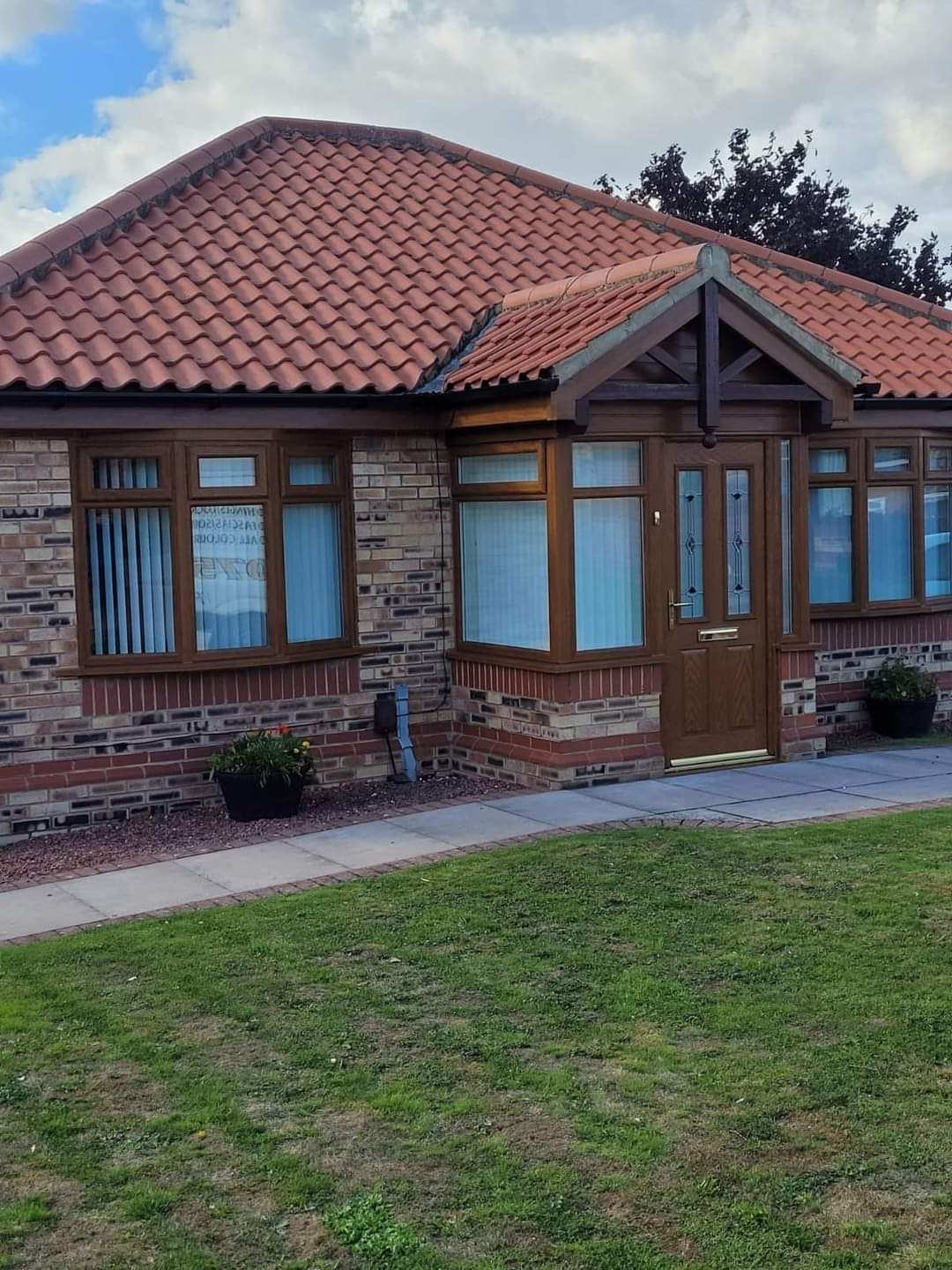 Rosewood window and door installation across bungalow frontage