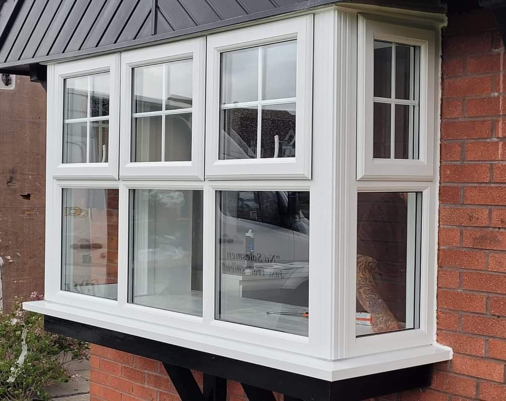 White uPVC bay window with Georgian bar detailing