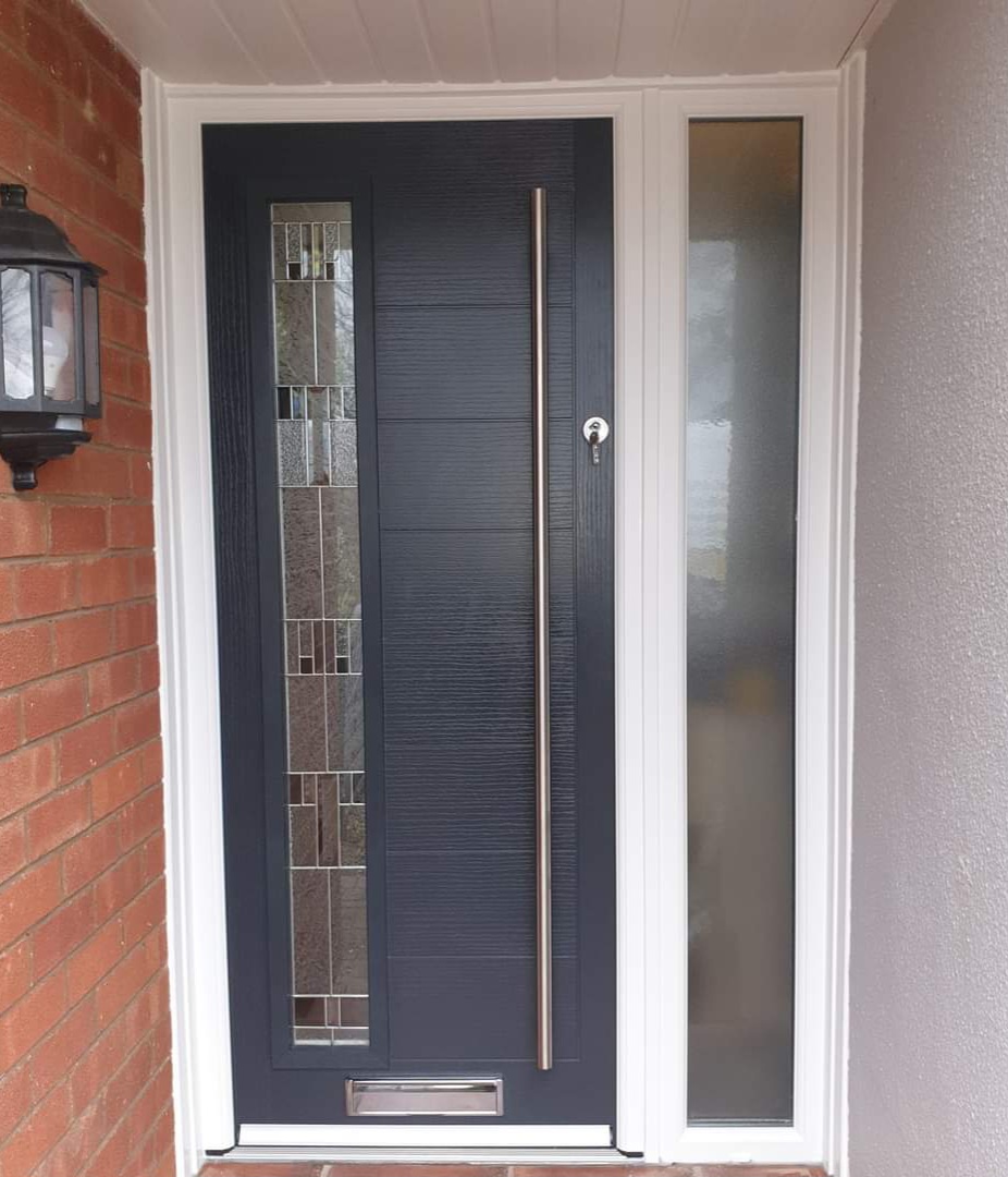 Anthracite grey composite door with tall decorative leaded sidelight