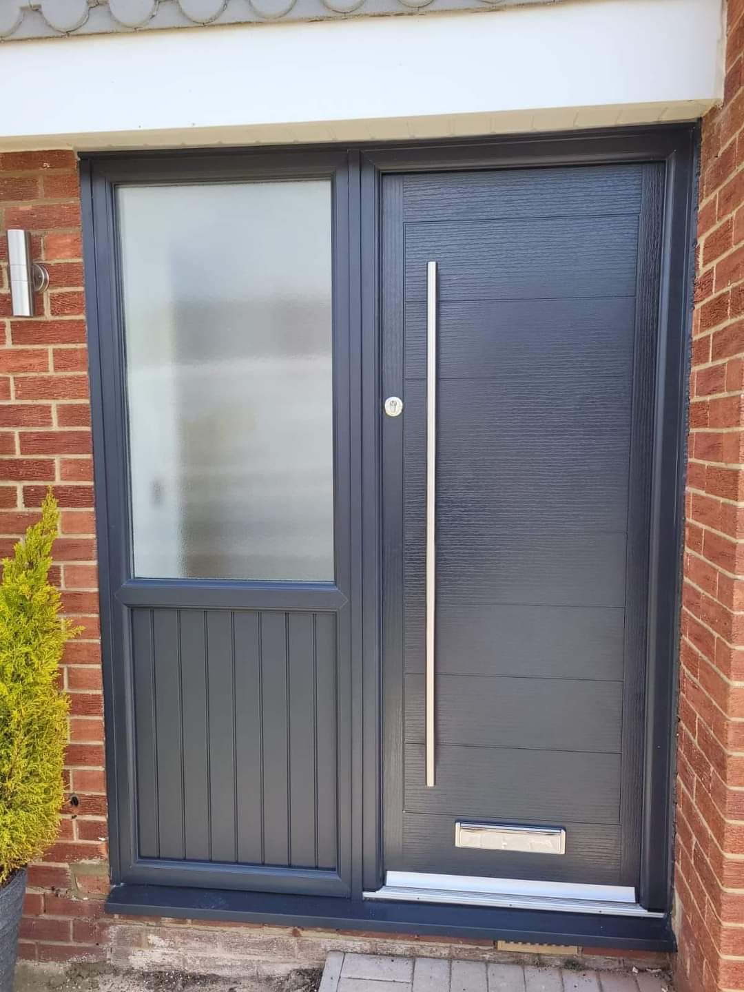 Anthracite grey composite door with frosted glass sidelight